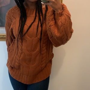 Knitted burnt orange sweater